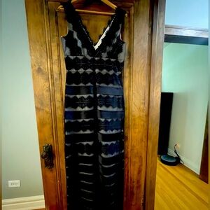 Full length formal black/nude gown.